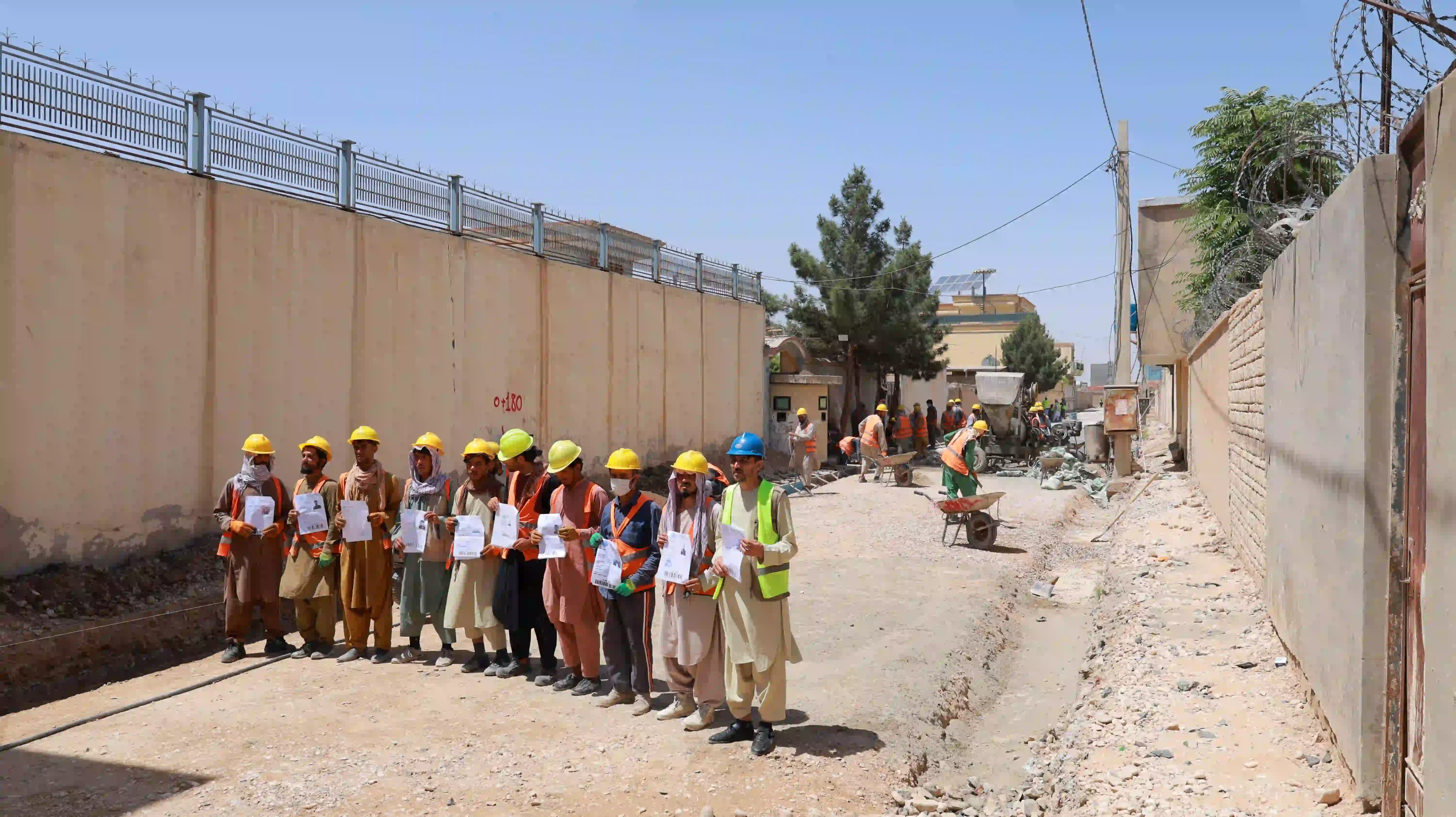 RETURNEES WORKING ON THE CONSTRUCTION OF PLUM CONCRETE SURFACE STREETS WITH A TOTAL LENGTH OF 500M, DISTRICT#3, MAZAR-E-SHARIF CITY