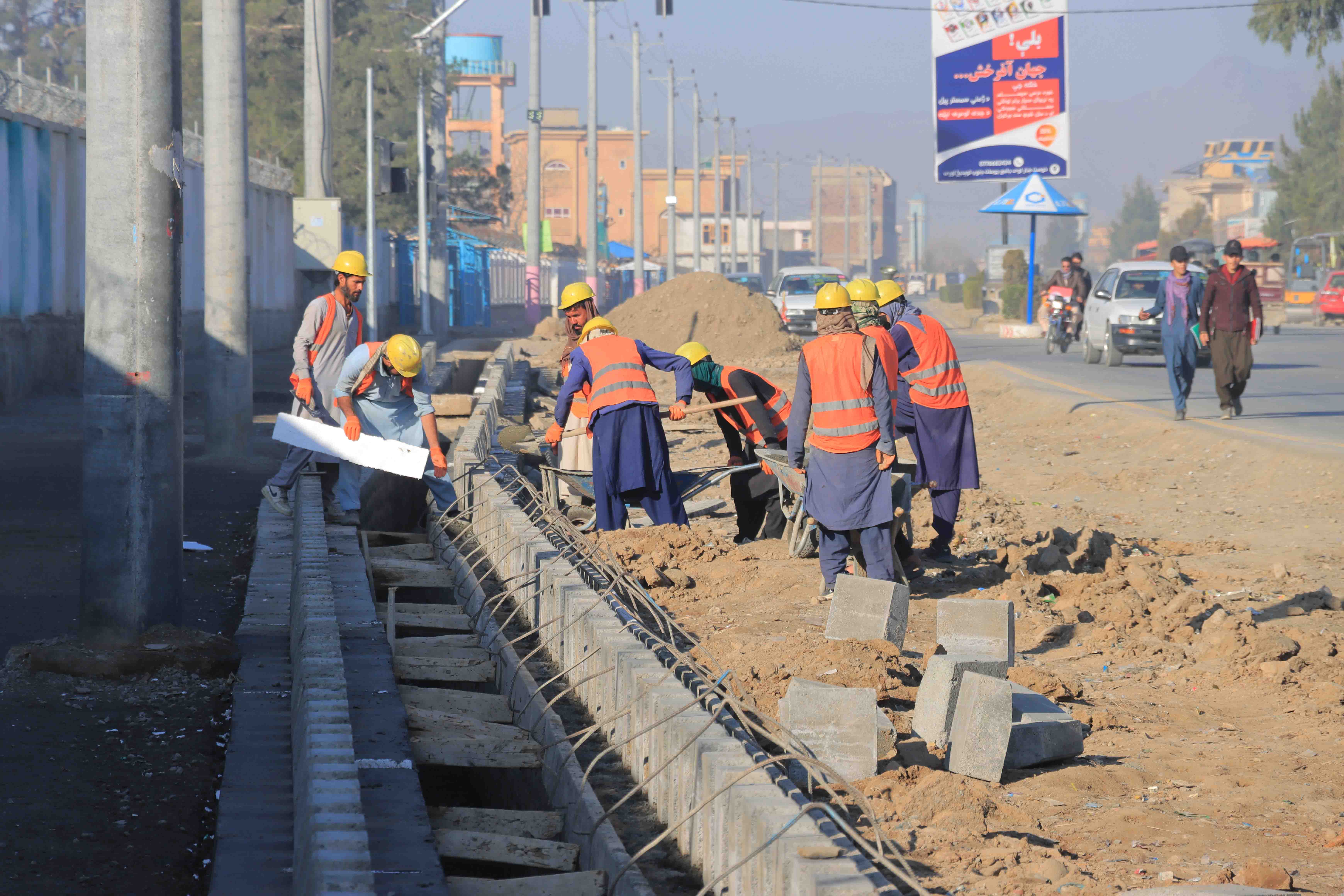 Laborers working on the 585m Sidewalk Project in PD 5 of Khost Province.