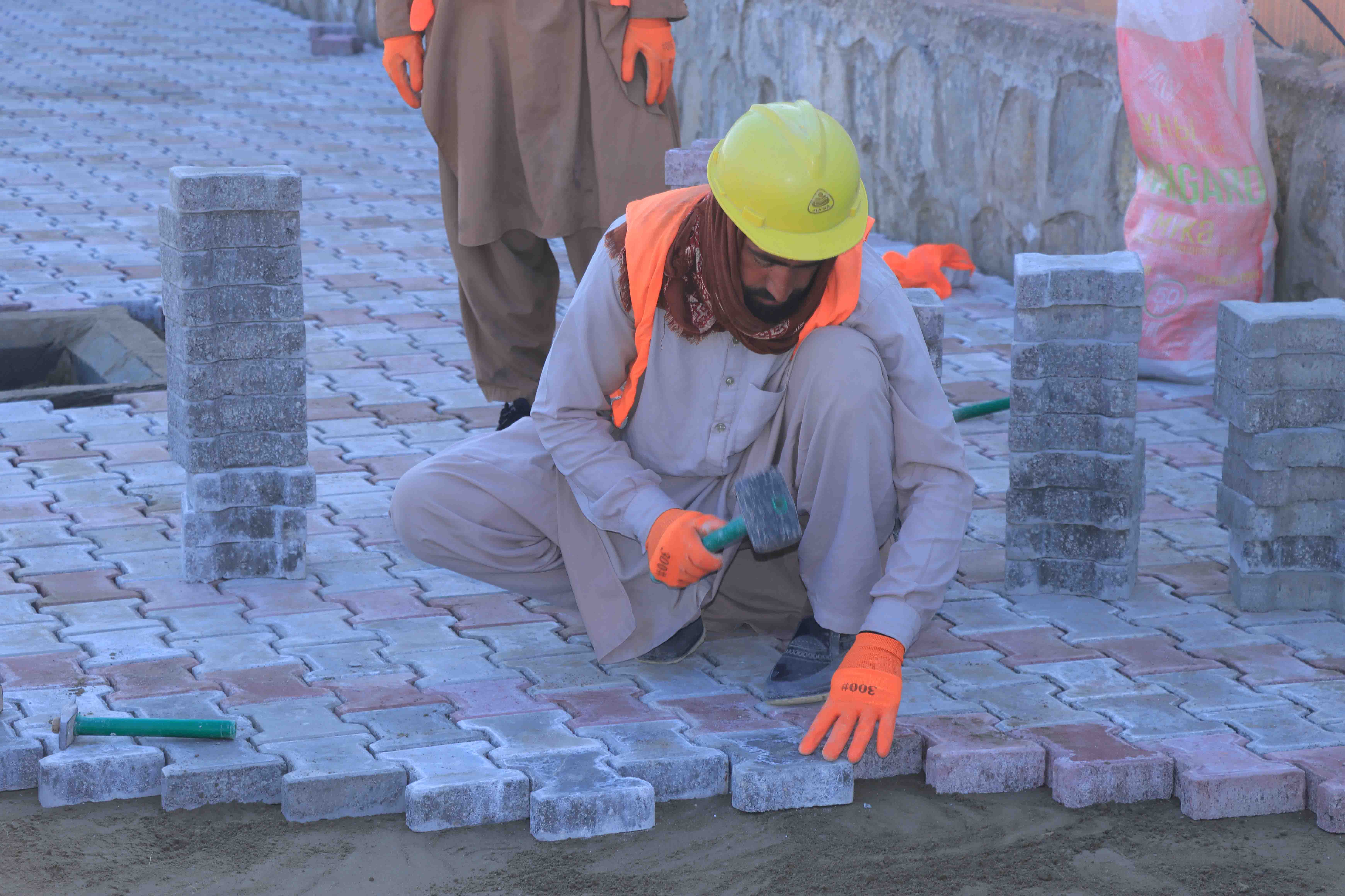 Laborers working on the 585m Sidewalk Project in PD 5 of Khost Province.